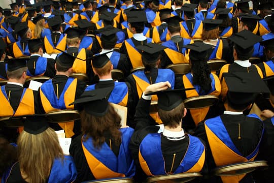 Graduates celebrating after securing their study abroad journey